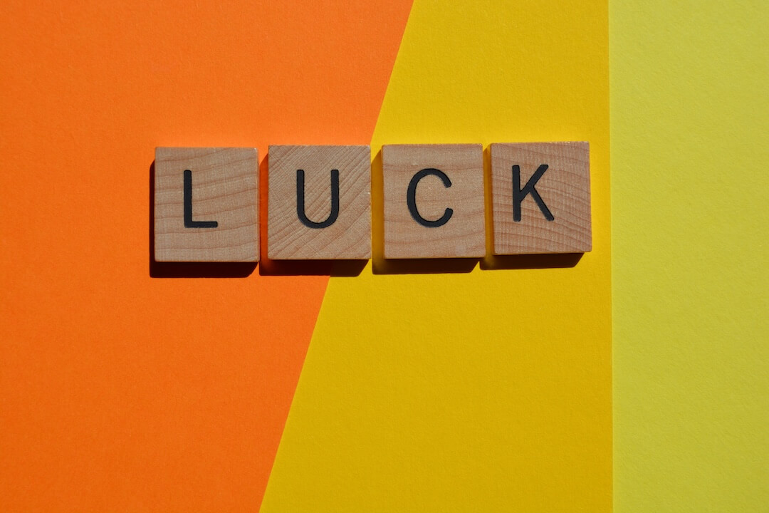 luck-word-in-3d-wooden-alphabet-letters-on-yellow-2023-11-27-05-12-20-utc-2
